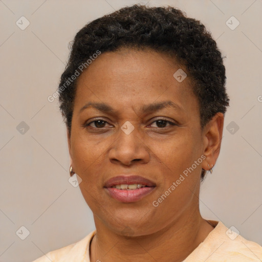 Joyful black adult female with short  brown hair and brown eyes