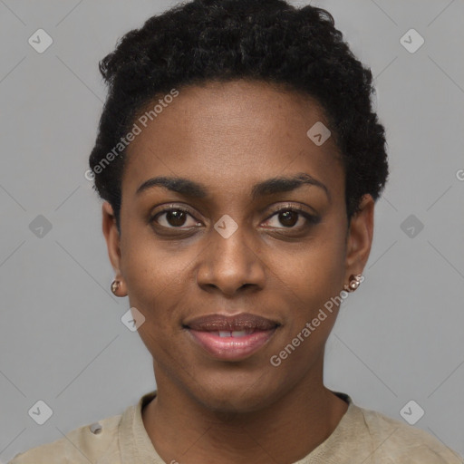 Joyful black young-adult female with short  black hair and brown eyes