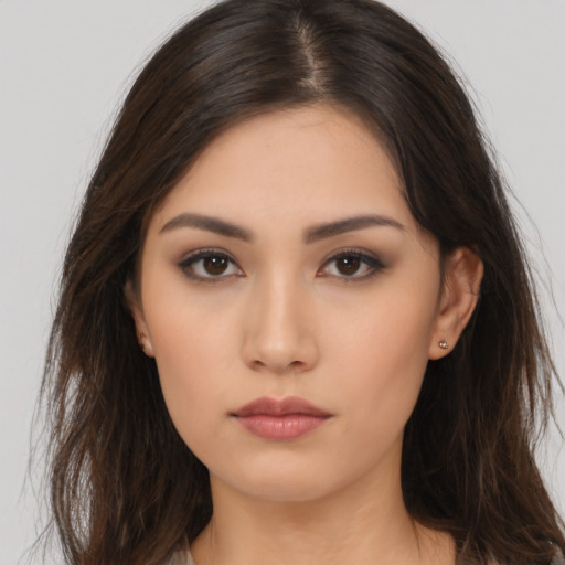 Neutral asian young-adult female with long  brown hair and brown eyes