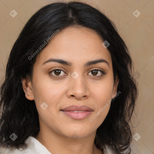 Joyful latino young-adult female with medium  brown hair and brown eyes