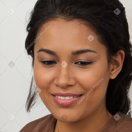 Joyful latino young-adult female with medium  brown hair and brown eyes