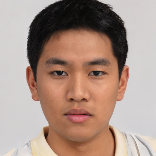 Neutral asian young-adult male with short  brown hair and brown eyes