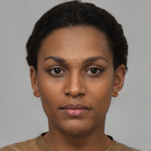 Neutral black young-adult female with short  black hair and brown eyes