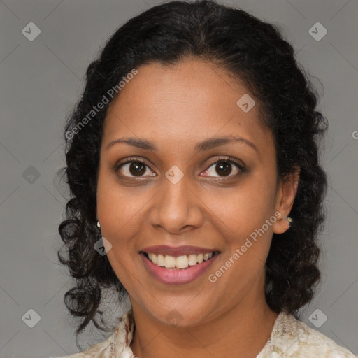 Joyful black young-adult female with medium  brown hair and brown eyes