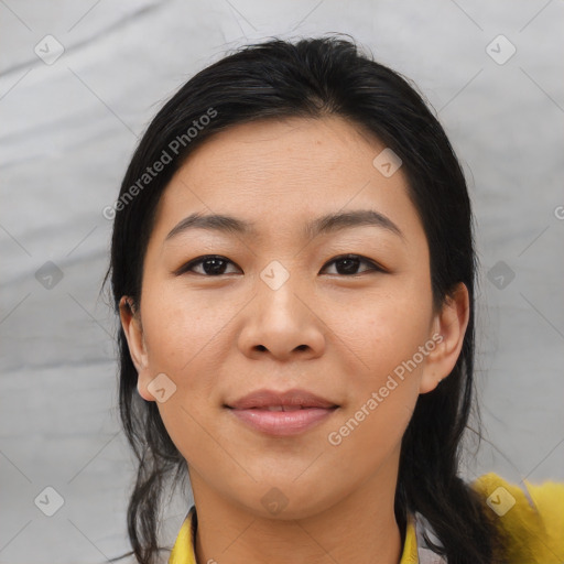 Joyful asian young-adult female with medium  black hair and brown eyes