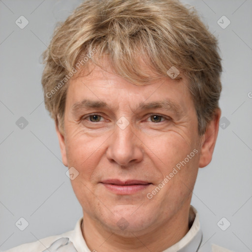 Joyful white middle-aged male with short  brown hair and brown eyes