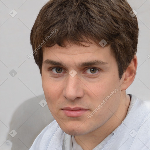 Neutral white young-adult male with short  brown hair and brown eyes