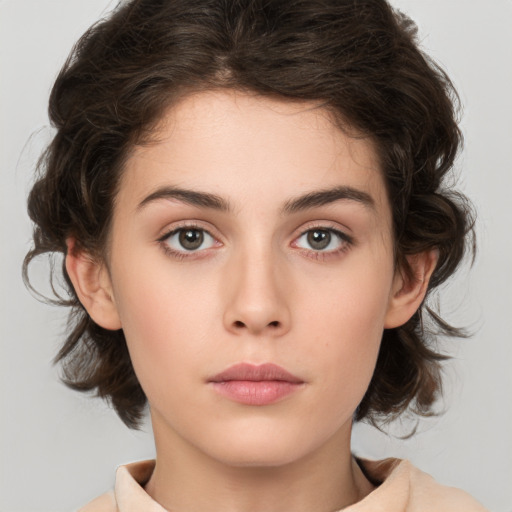 Neutral white young-adult female with medium  brown hair and brown eyes