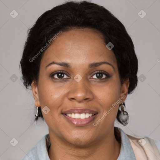 Joyful black young-adult female with medium  brown hair and brown eyes