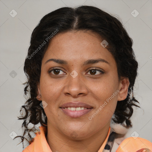 Joyful black adult female with medium  brown hair and brown eyes