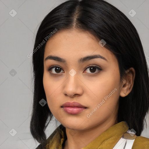 Joyful asian young-adult female with medium  black hair and brown eyes