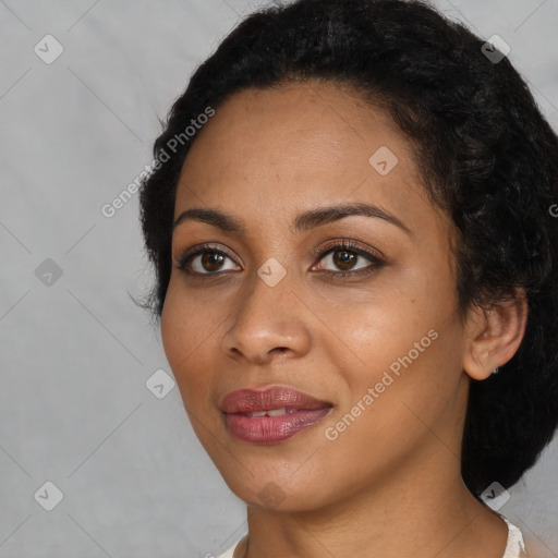 Joyful latino young-adult female with short  black hair and brown eyes