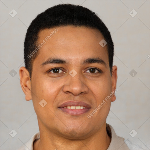 Joyful latino young-adult male with short  black hair and brown eyes