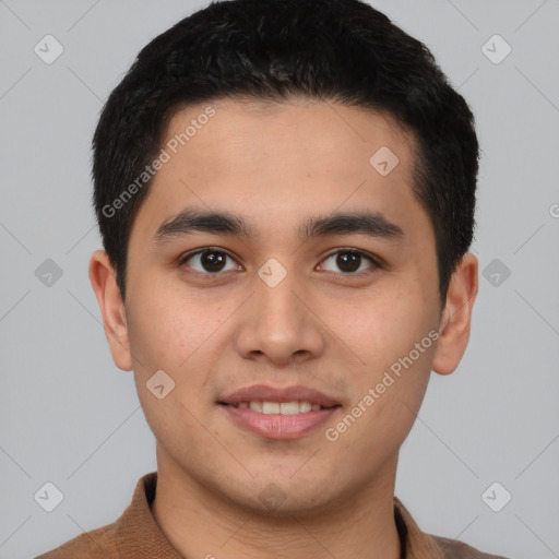 Joyful white young-adult male with short  black hair and brown eyes