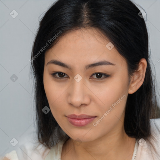 Joyful asian young-adult female with long  brown hair and brown eyes