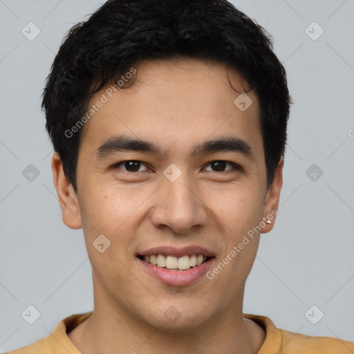 Joyful latino young-adult male with short  brown hair and brown eyes