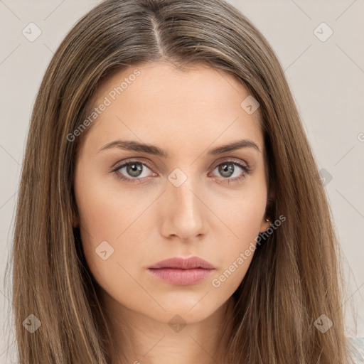 Neutral white young-adult female with long  brown hair and brown eyes