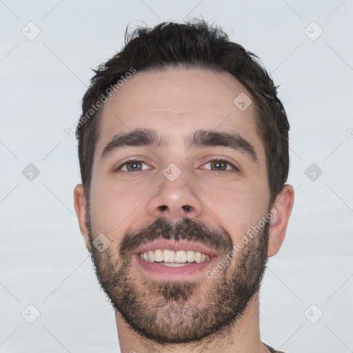 Joyful white young-adult male with short  black hair and brown eyes