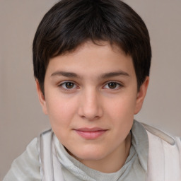 Joyful white child female with short  brown hair and brown eyes