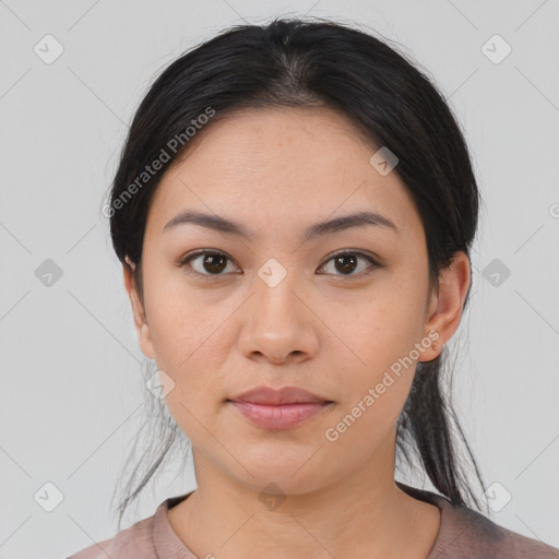 Joyful asian young-adult female with medium  black hair and brown eyes