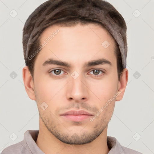 Neutral white young-adult male with short  brown hair and brown eyes