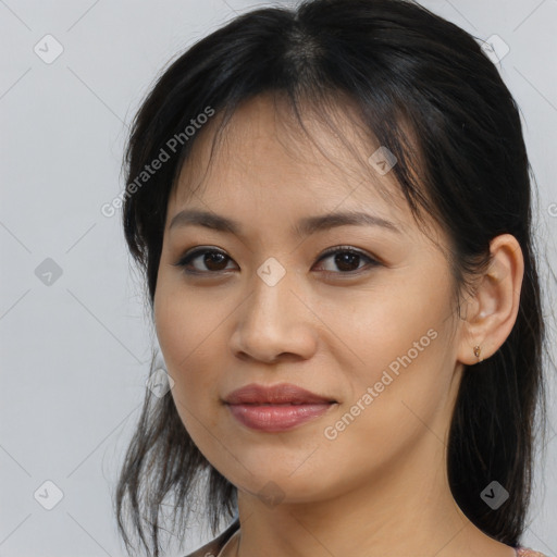 Joyful asian young-adult female with medium  brown hair and brown eyes