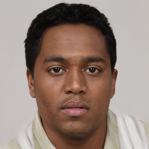 Neutral black young-adult male with short  black hair and brown eyes