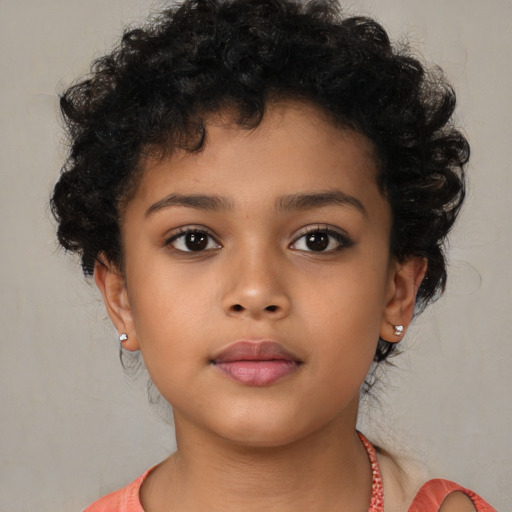 Neutral latino child female with short  brown hair and brown eyes