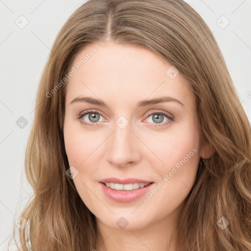 Joyful white young-adult female with long  brown hair and green eyes