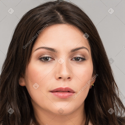 Neutral white young-adult female with long  brown hair and brown eyes