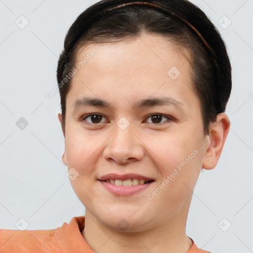 Joyful white young-adult female with short  brown hair and brown eyes