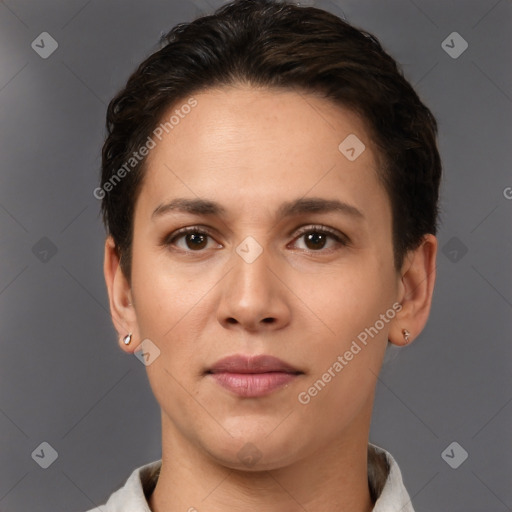 Joyful white young-adult female with short  brown hair and brown eyes