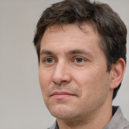 Neutral white adult male with short  brown hair and brown eyes