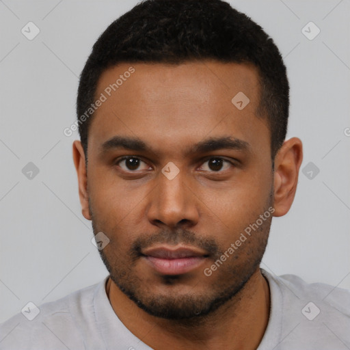 Neutral latino young-adult male with short  black hair and brown eyes