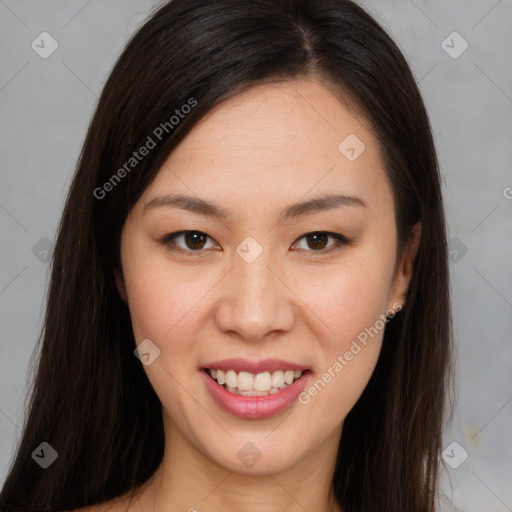 Joyful asian young-adult female with long  brown hair and brown eyes