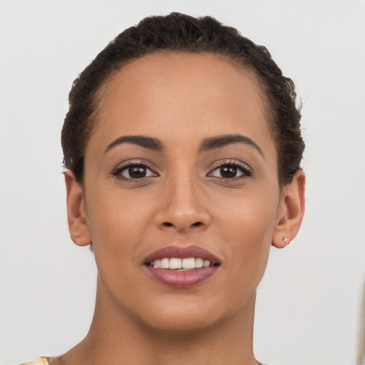 Joyful white young-adult female with short  brown hair and brown eyes