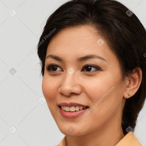 Joyful white young-adult female with medium  brown hair and brown eyes