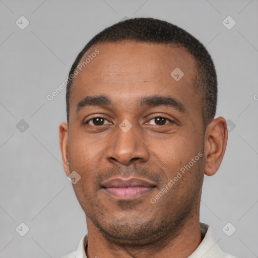 Neutral latino young-adult male with short  brown hair and brown eyes