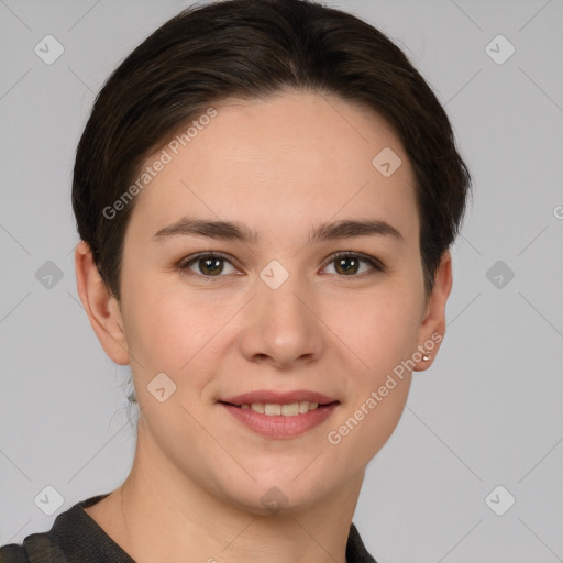 Joyful white young-adult female with short  brown hair and brown eyes