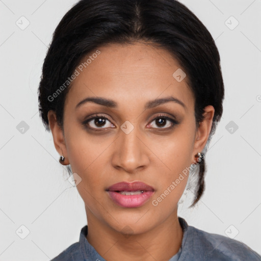 Joyful latino young-adult female with medium  black hair and brown eyes