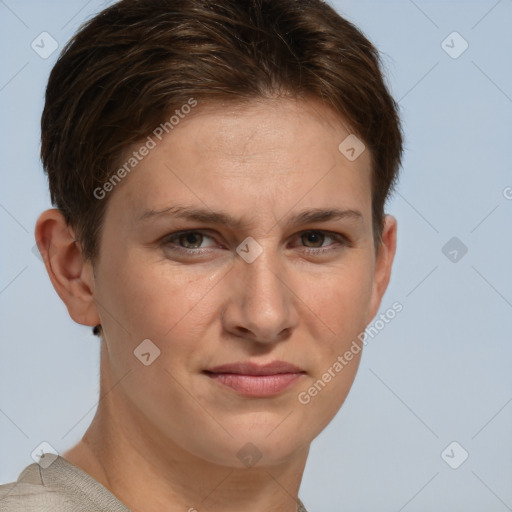 Joyful white young-adult female with short  brown hair and grey eyes