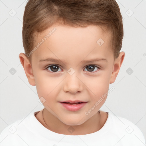 Joyful white child male with short  brown hair and brown eyes