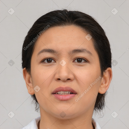 Joyful asian young-adult female with medium  brown hair and brown eyes