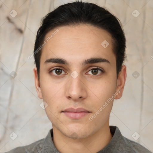 Neutral white young-adult male with short  brown hair and brown eyes