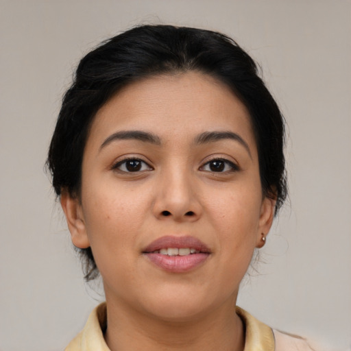 Joyful asian young-adult female with medium  brown hair and brown eyes