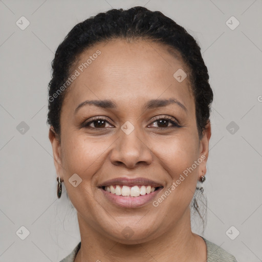 Joyful latino young-adult female with short  black hair and brown eyes