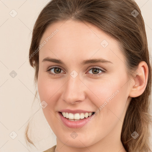 Joyful white young-adult female with long  brown hair and green eyes