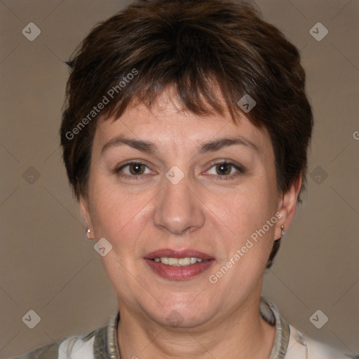 Joyful white adult female with short  brown hair and brown eyes