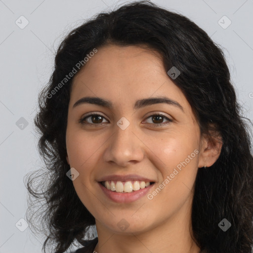 Joyful latino young-adult female with long  brown hair and brown eyes