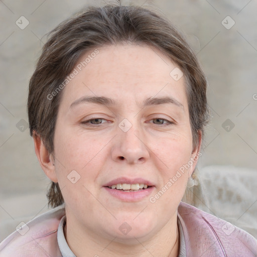 Joyful white adult female with short  brown hair and grey eyes